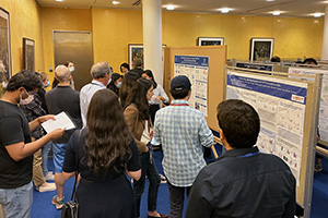 Participants attend poster session presentations in chemical biology at the 2022 Tri-I Chemical Biology Symposium
