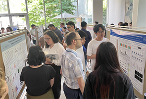 TPCB faculty members Viviana Risca and Daniel Heller view posters at the 2024 Tri-I Chemical Biology Symposium