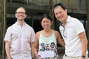 TPCB student Clare Cahir (center) with Prof. Dan Heller (left) and Prof. Derek Tan (right) at the TPCB Service Award Ceremony