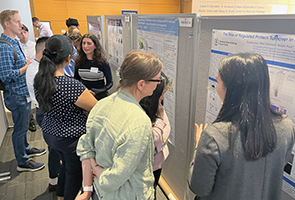TPCB student Michelle Guo presents her work to Prof. Susan Shao and Prof. Olga Boudker  at the 2025 Tri-Institutional Chemical Biology Symposium